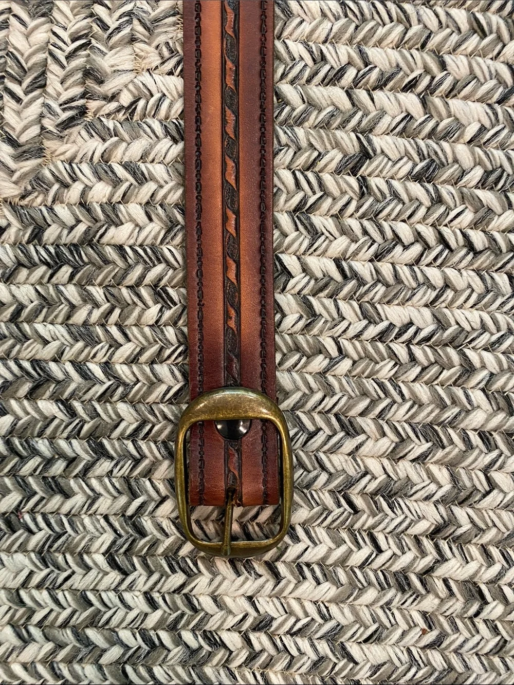 Vintage brown tooled leather belt 47” long 1.5” wide brass